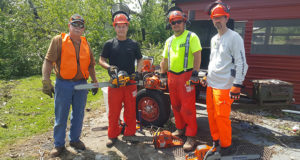 Photo for Rotary Corp Copphead Chainsaw Team in Outdoor Power Equipment Magazine article